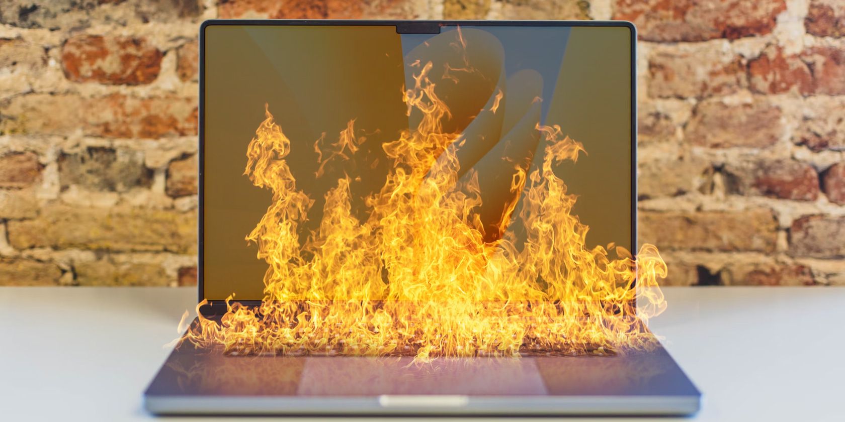 MacBook Pro with fire on it