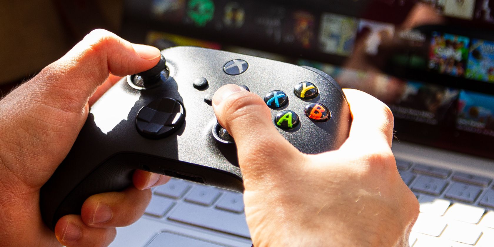 man using Xbox controller with Chromebook feature