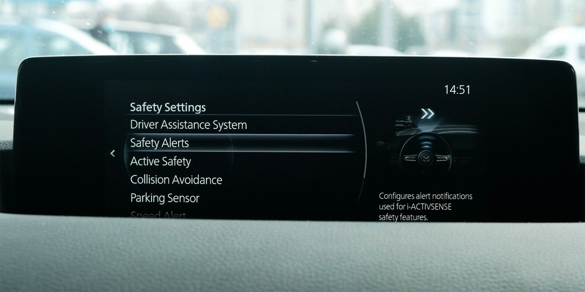 Closeup view of a Mazda MX-30 infotainment screen.