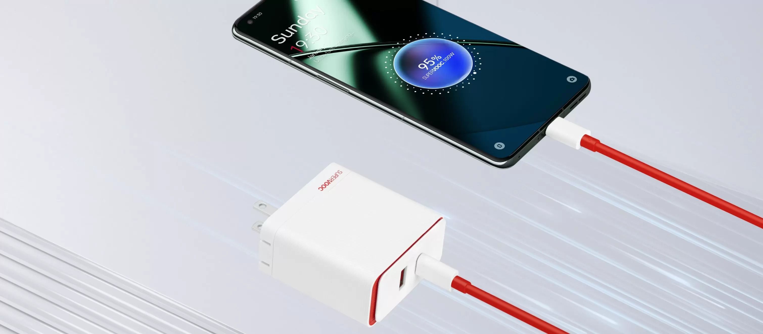 A OnePlus charging brick, cable, and device
