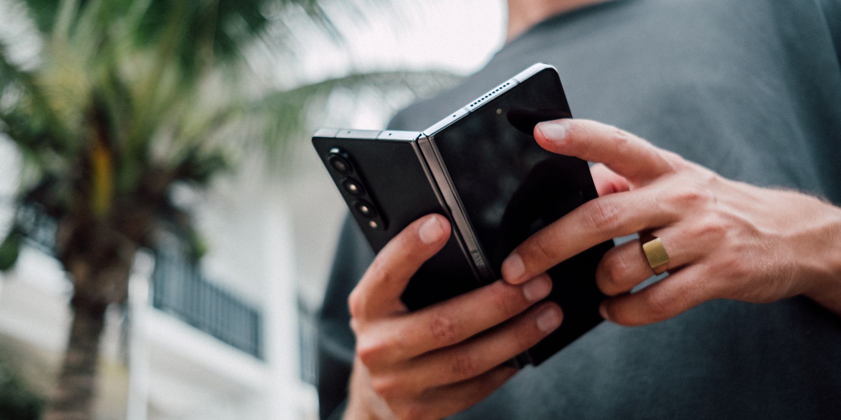 Person holding a foldable smartphone