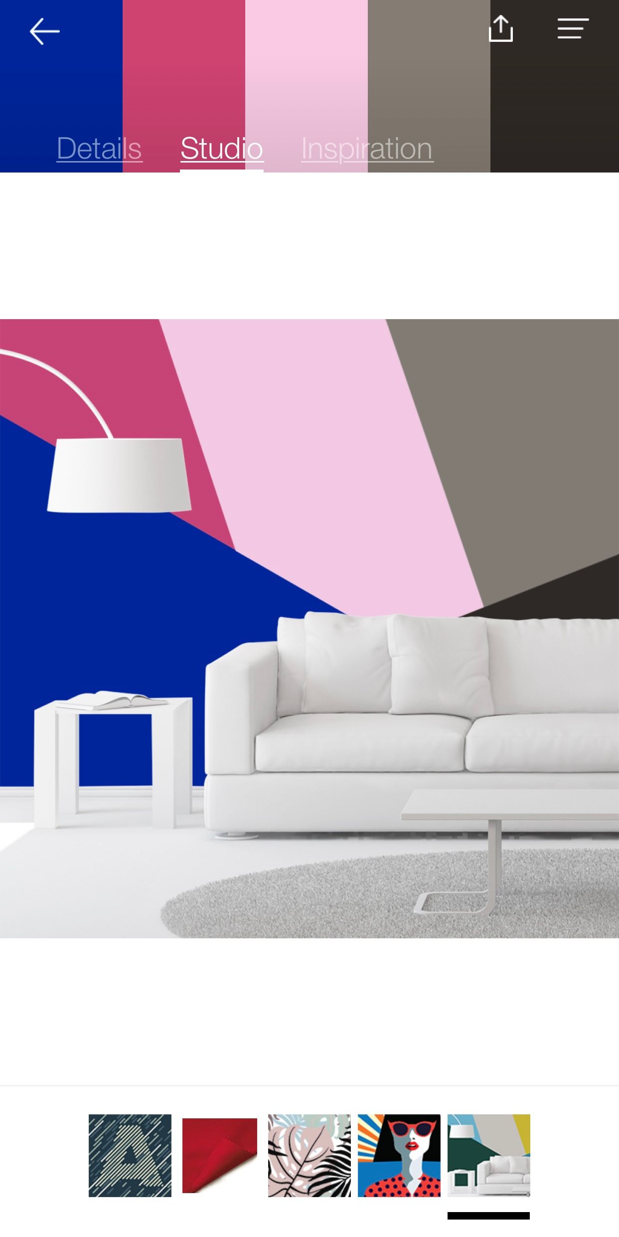 Blue, pink, and grey living room walls with white floors, couch, side table, and lamp