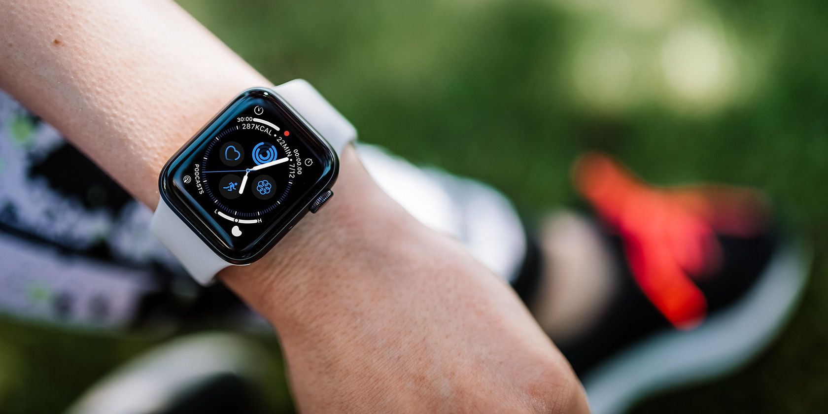 Person exercising using Apple Watch custom face
