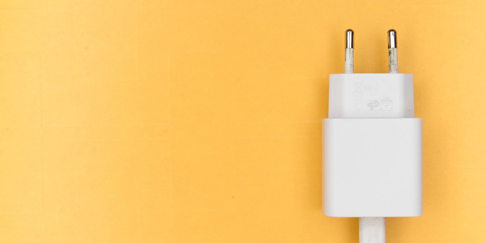 Iphone adapter on yellow background