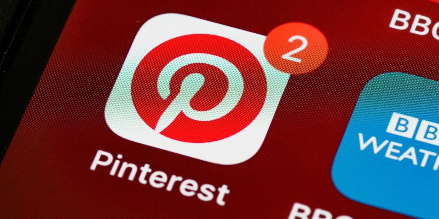Extreme close up of the Pinterest app icon on a phone screen