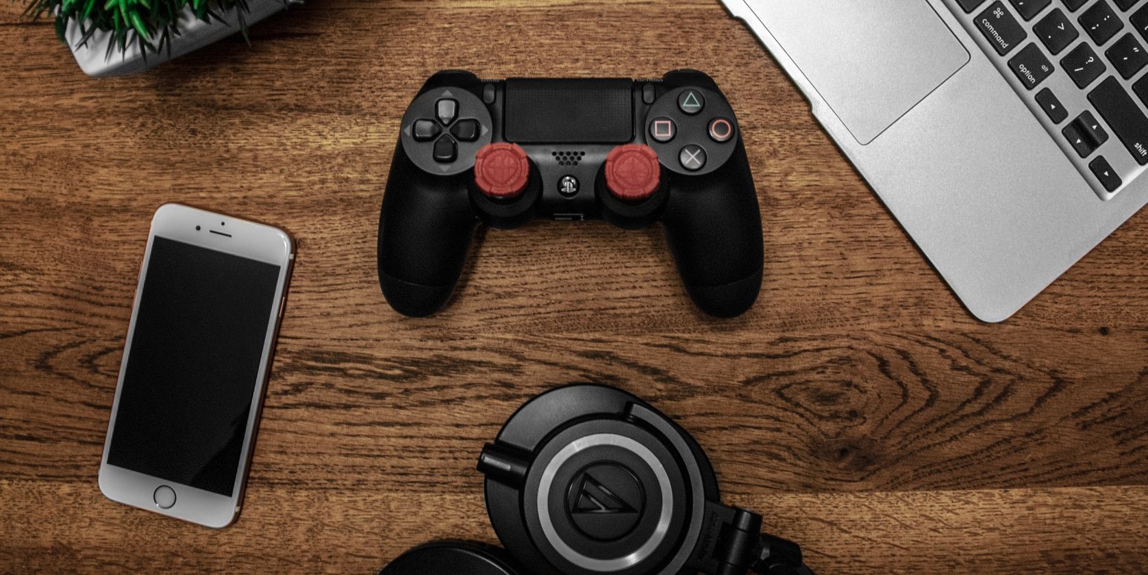 PlayStation Controller on Wooden Surface