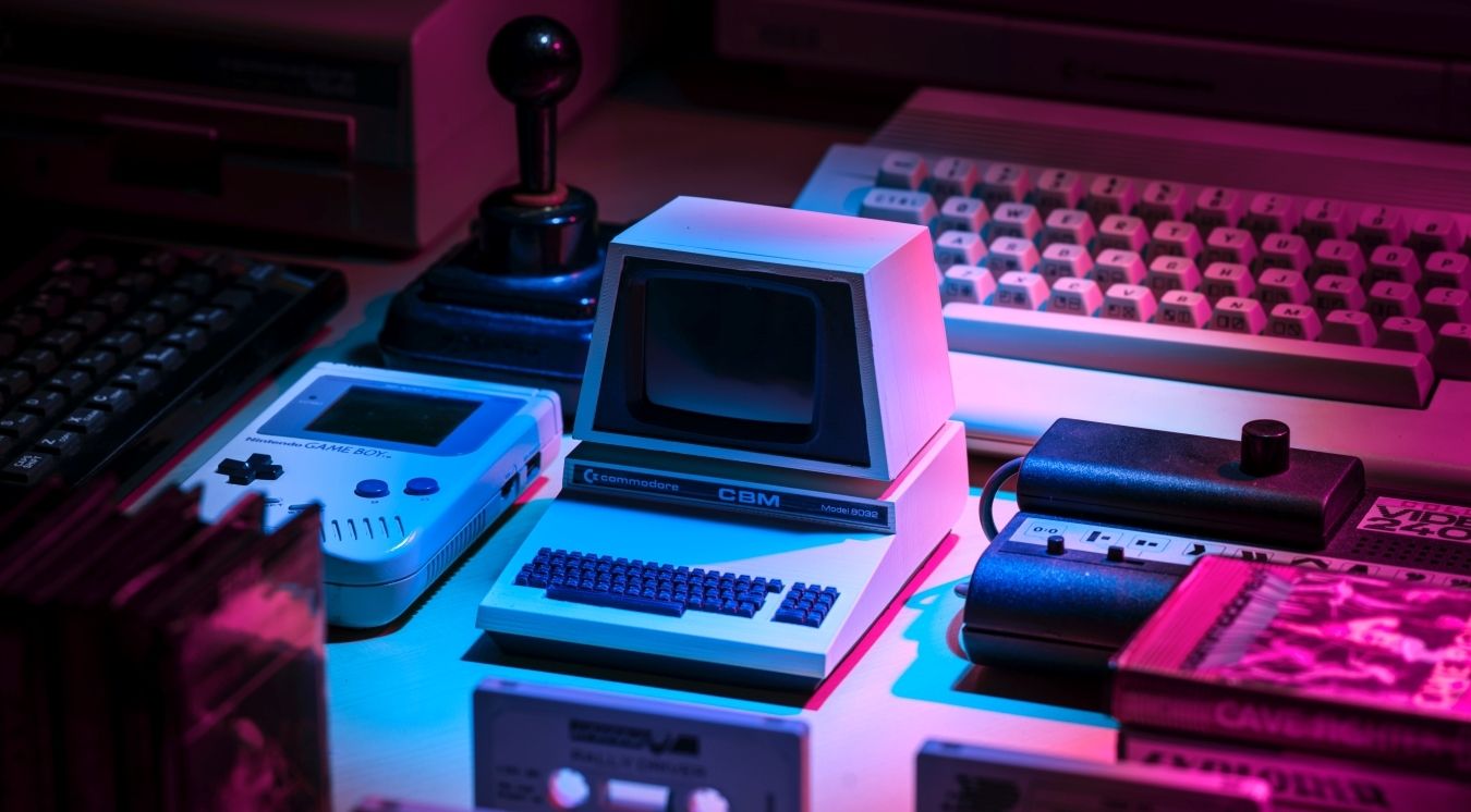 A photograph of a display of retro gaming consoles 