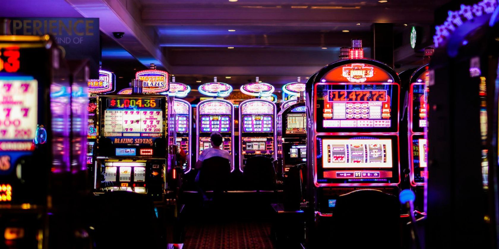 Slot machines in a dimly lit casino