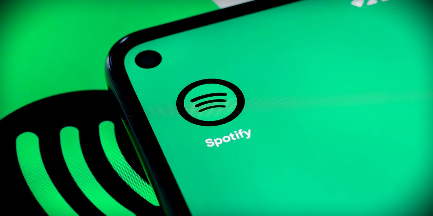 spotify logo on mobile phone feature