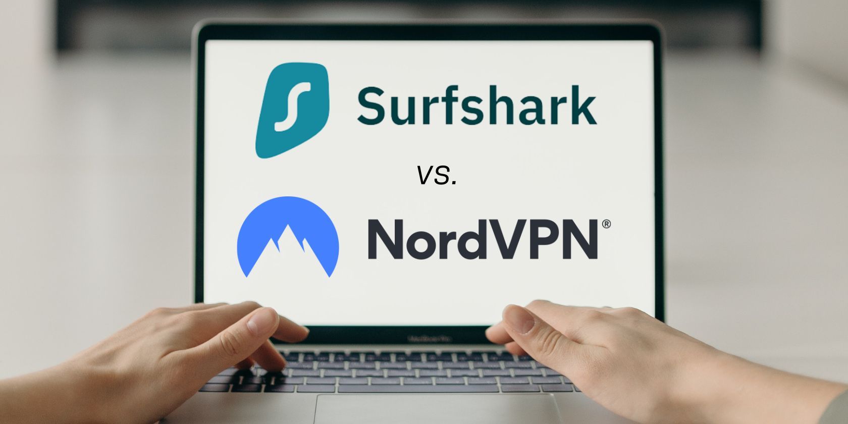 surfshark and nord vpn logos on laptop being used by person 