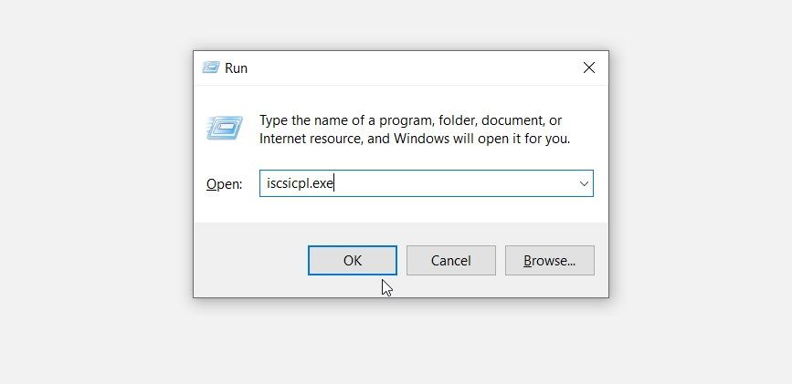 Typing iscsicpl.exe in the Run command dialog box
