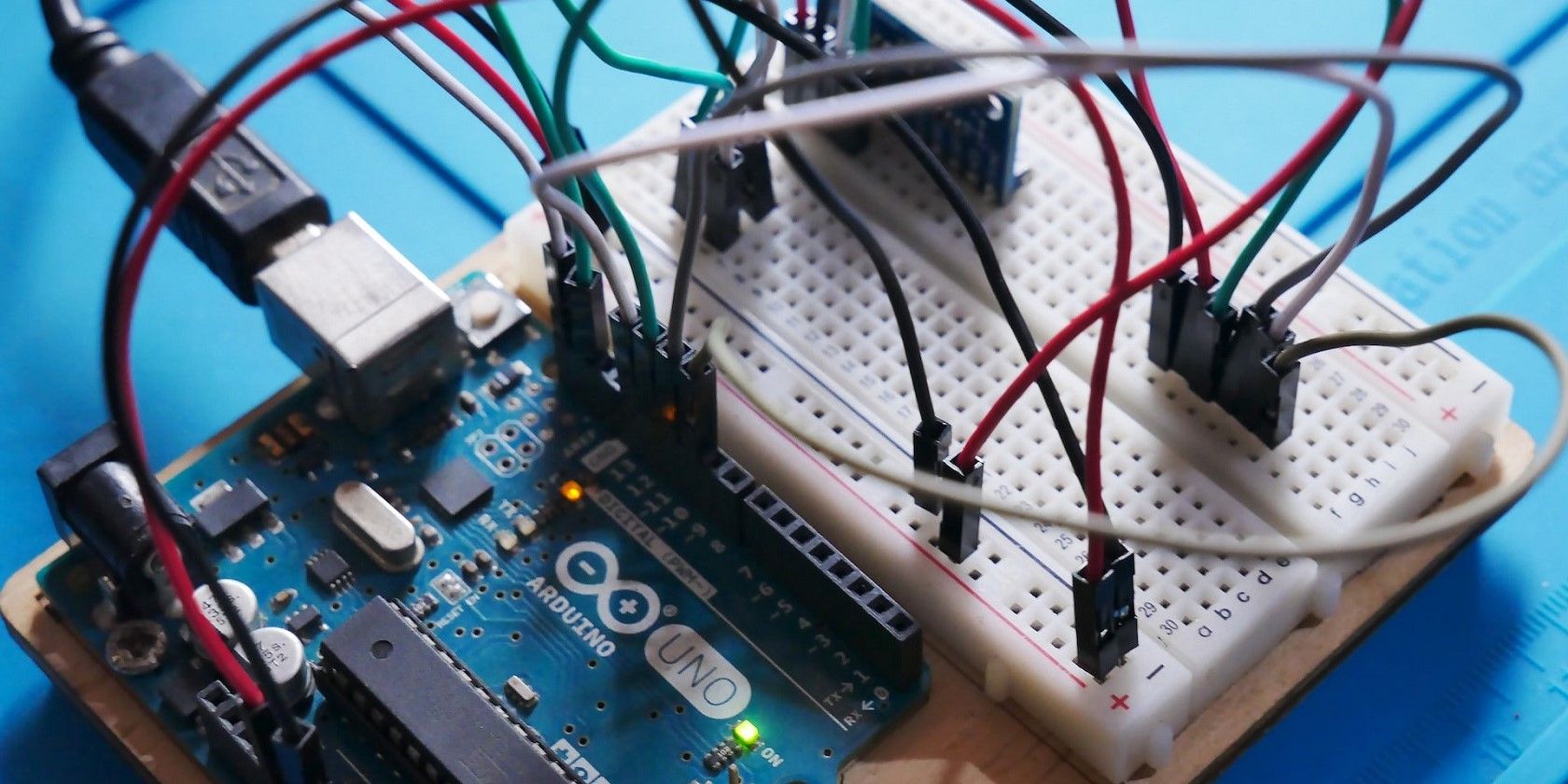 An Arduino Uno connected to a breadboard