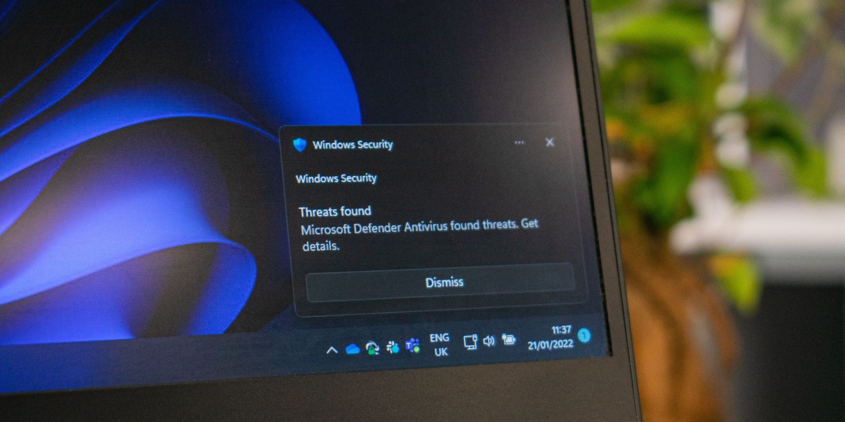 windows defender security notification on laptop screen