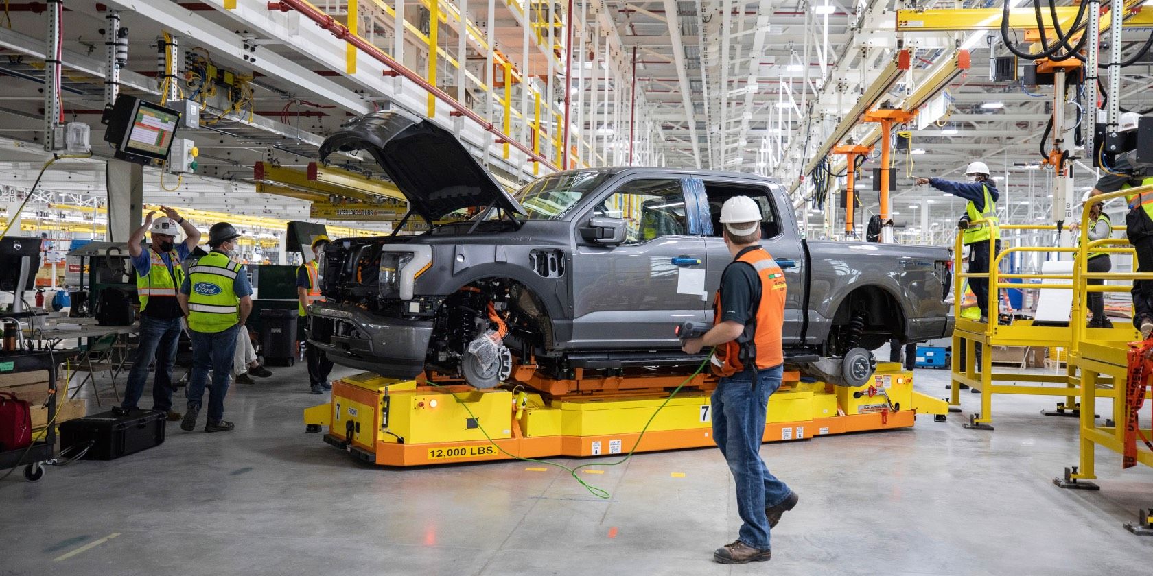 Grey Ford F-150 Lighting being built at a production plant