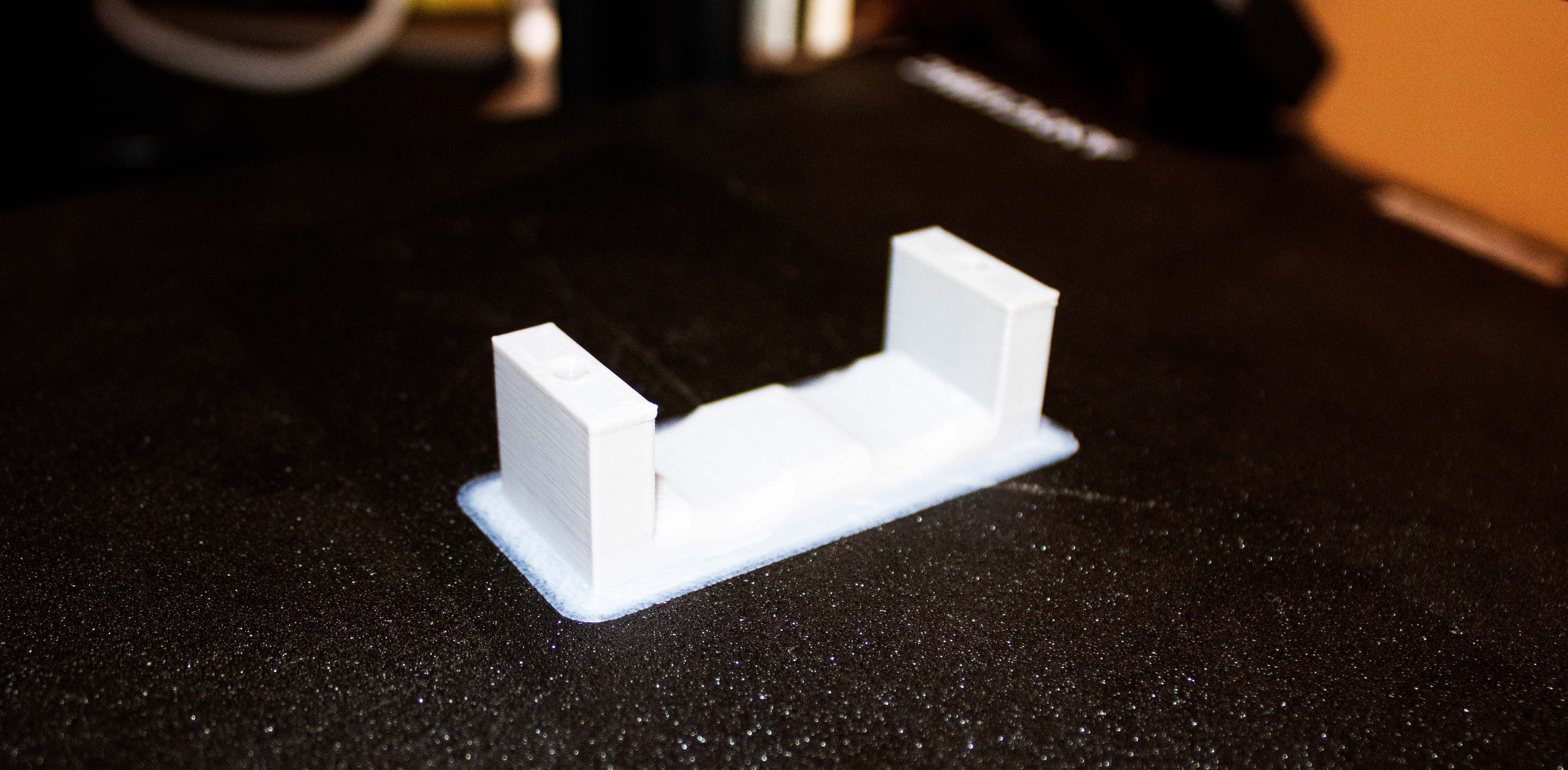 3D printed white battery holder