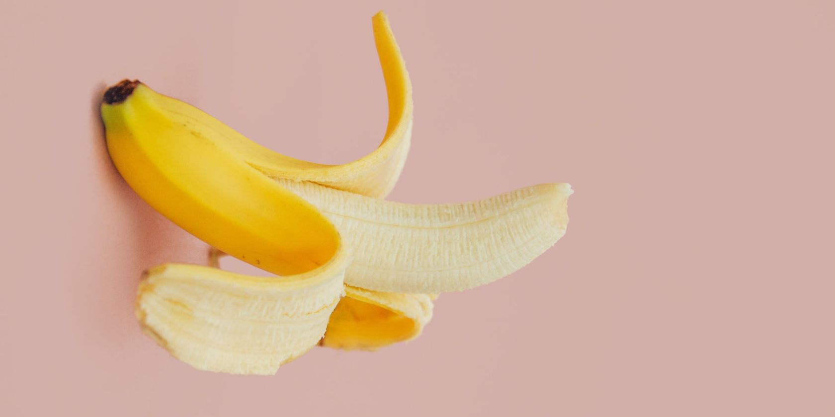 a partially peeled banana