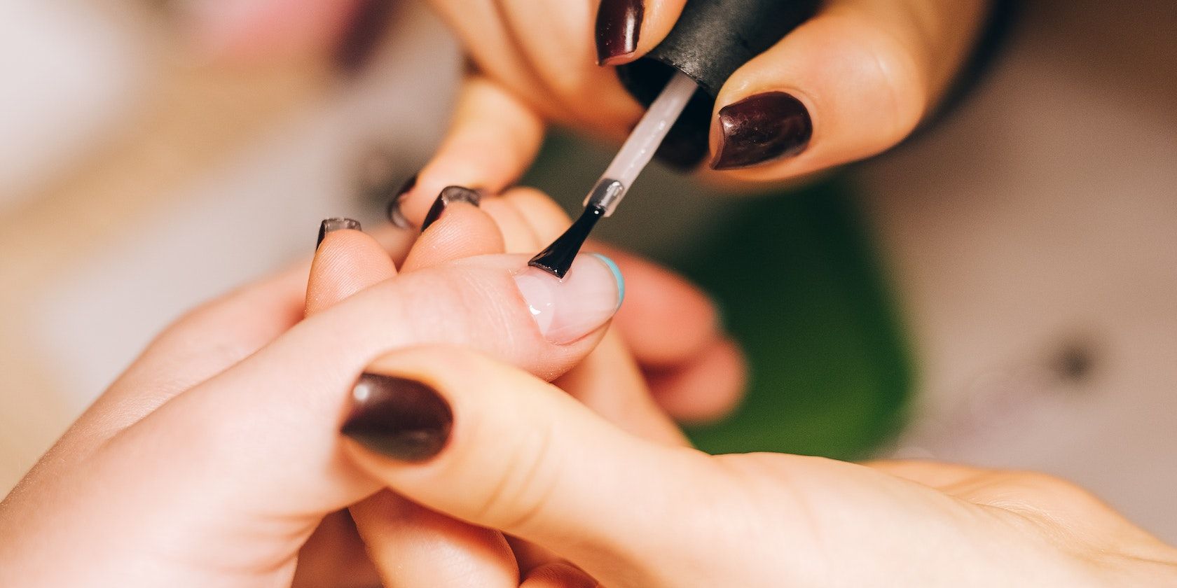 A person getting a nail polish