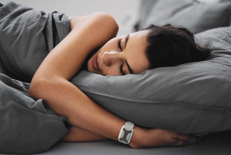  Woman Sleeping While Wearing Apollo Neuro