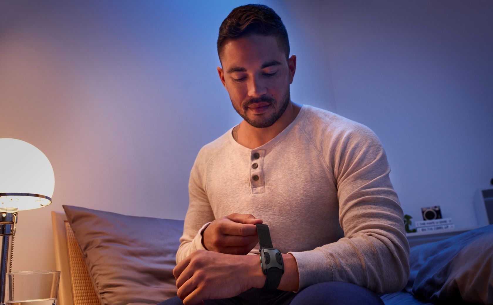 Person Putting On Apollo Wearable at Bedtime