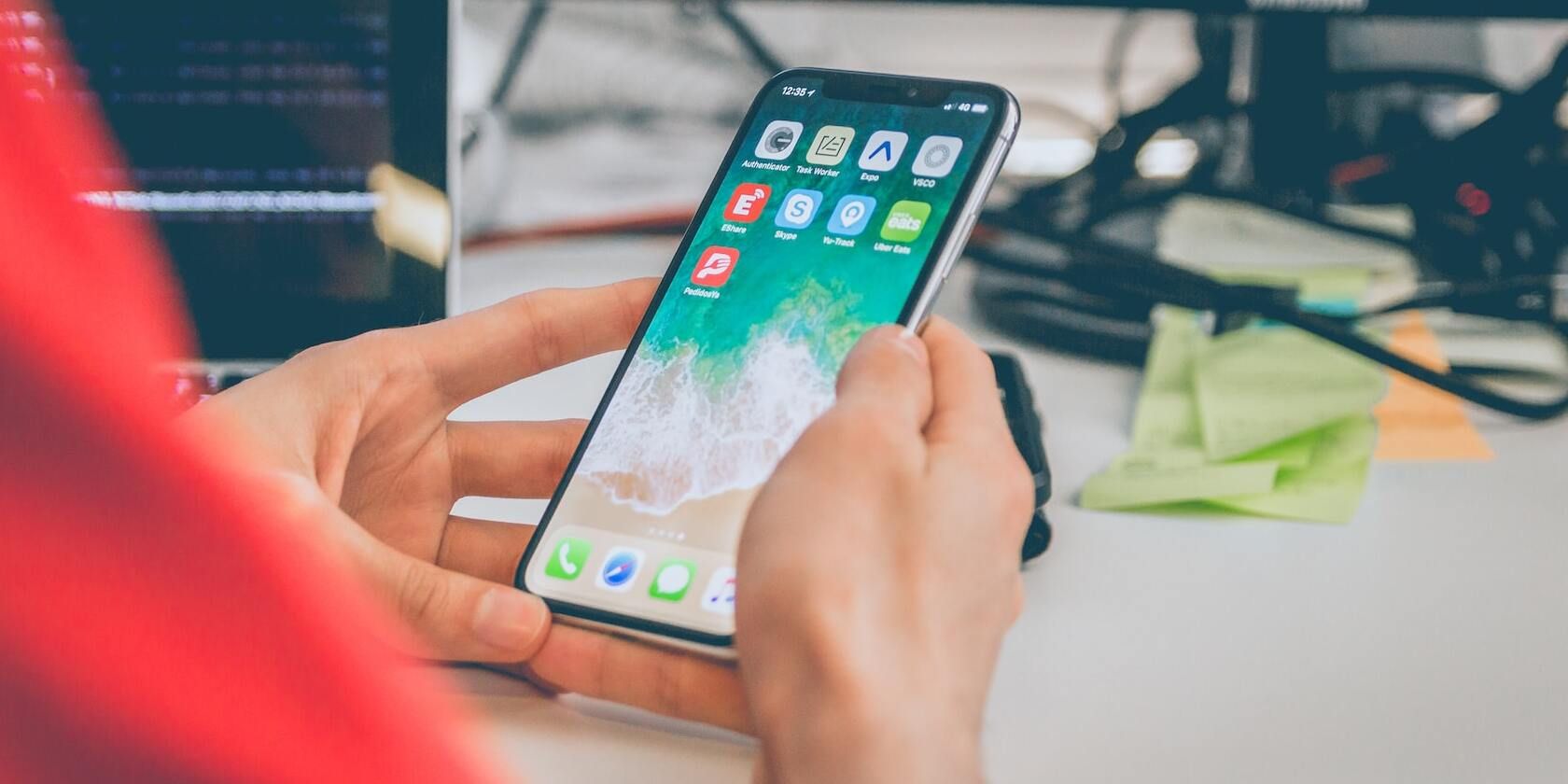 Image of a person looking at an iPhone