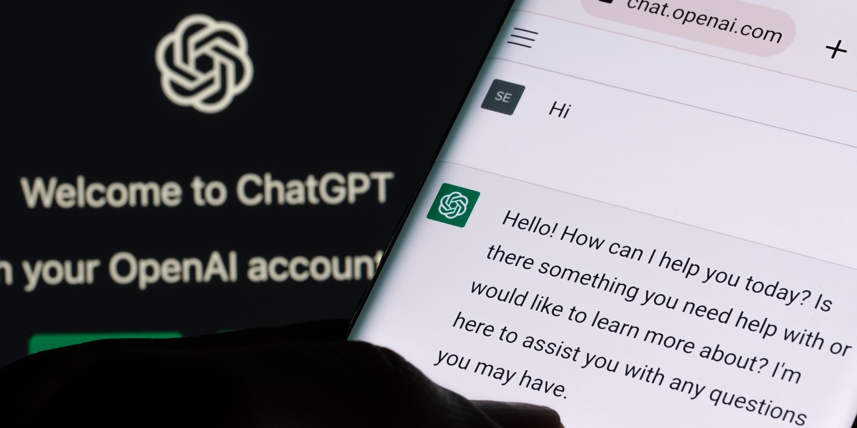 chatgpt logo and message on smartphone feature