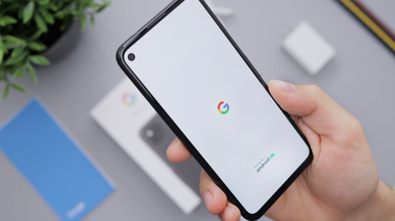 A photo of an Android phone with the Google logo.
