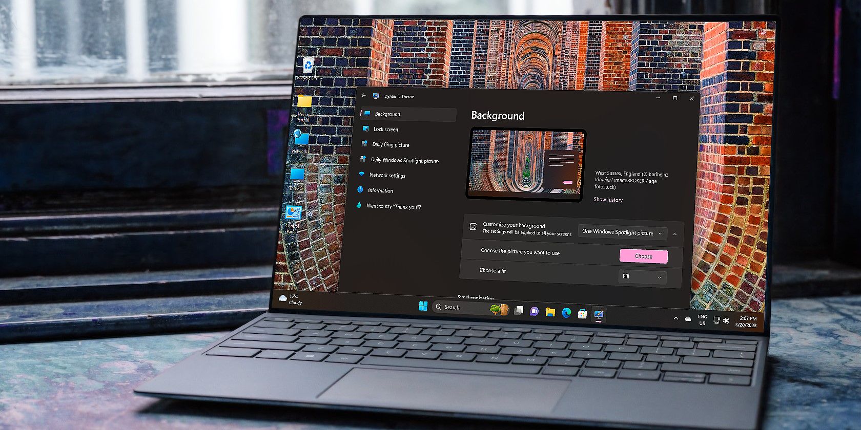 Windows Laptop With Dynamic Theme App on Screen