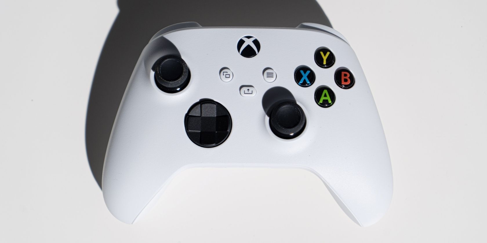 A photograph of a white Xbox Wireless Controller 