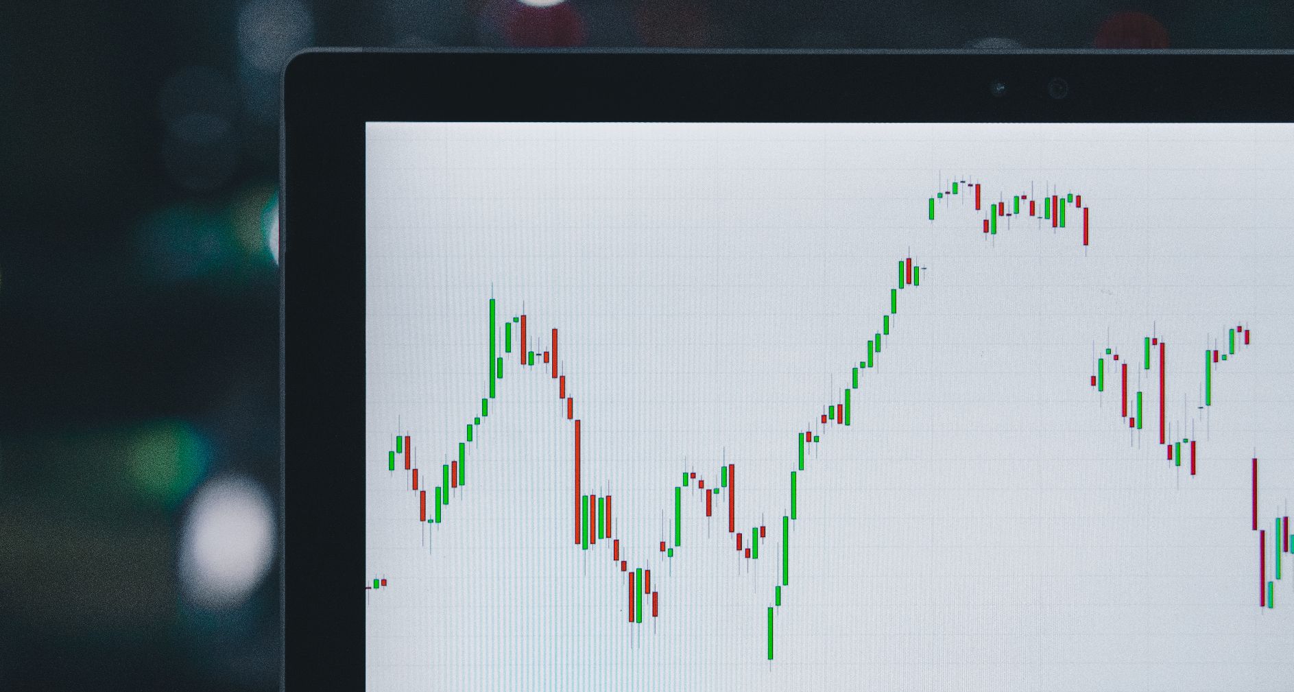 close-up of candlestick graph on laptop screen