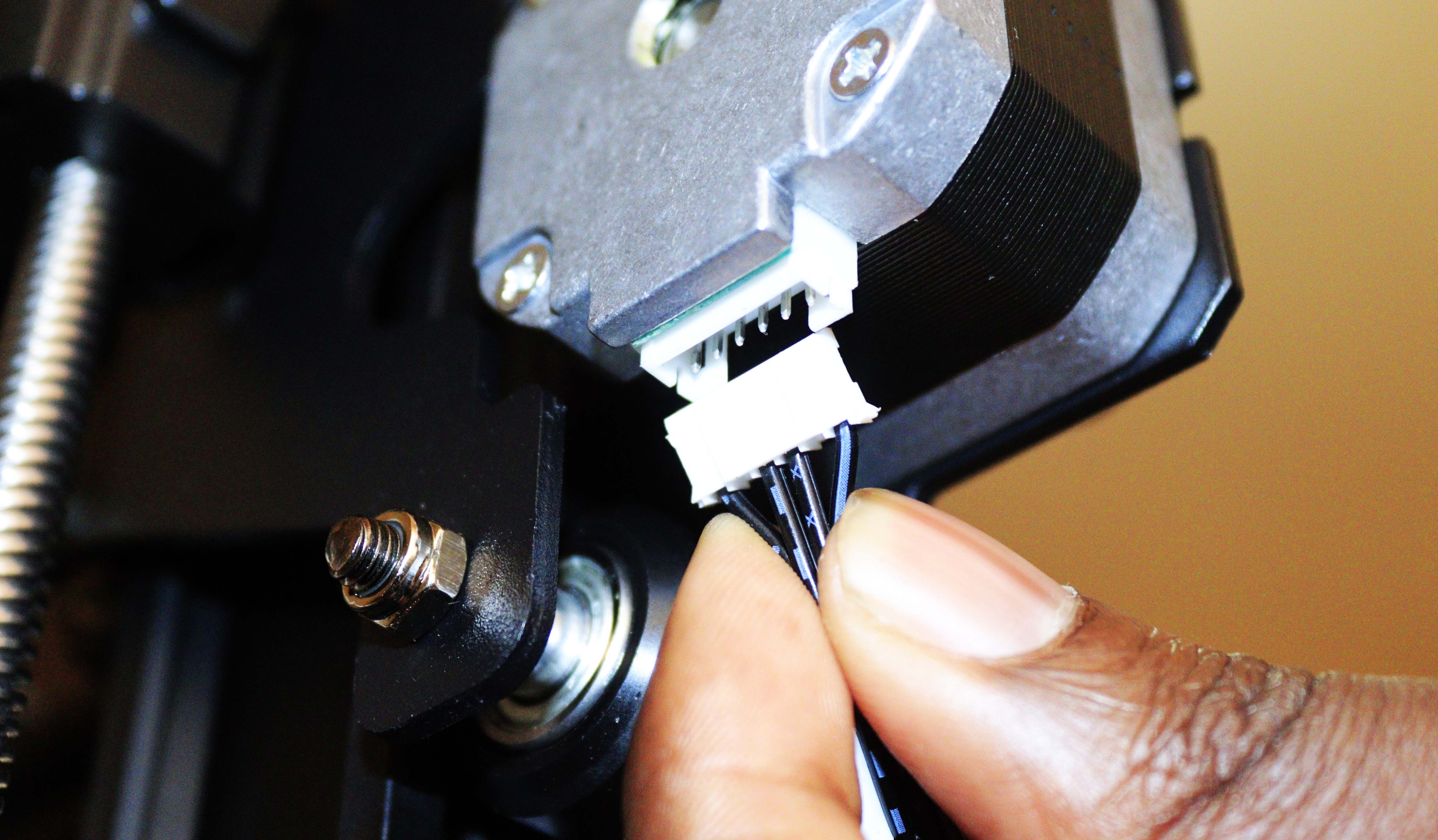 Inserting wires to motors of the printer