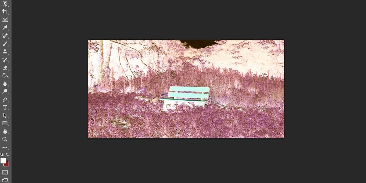 A negative image of a bench in Photoshop
