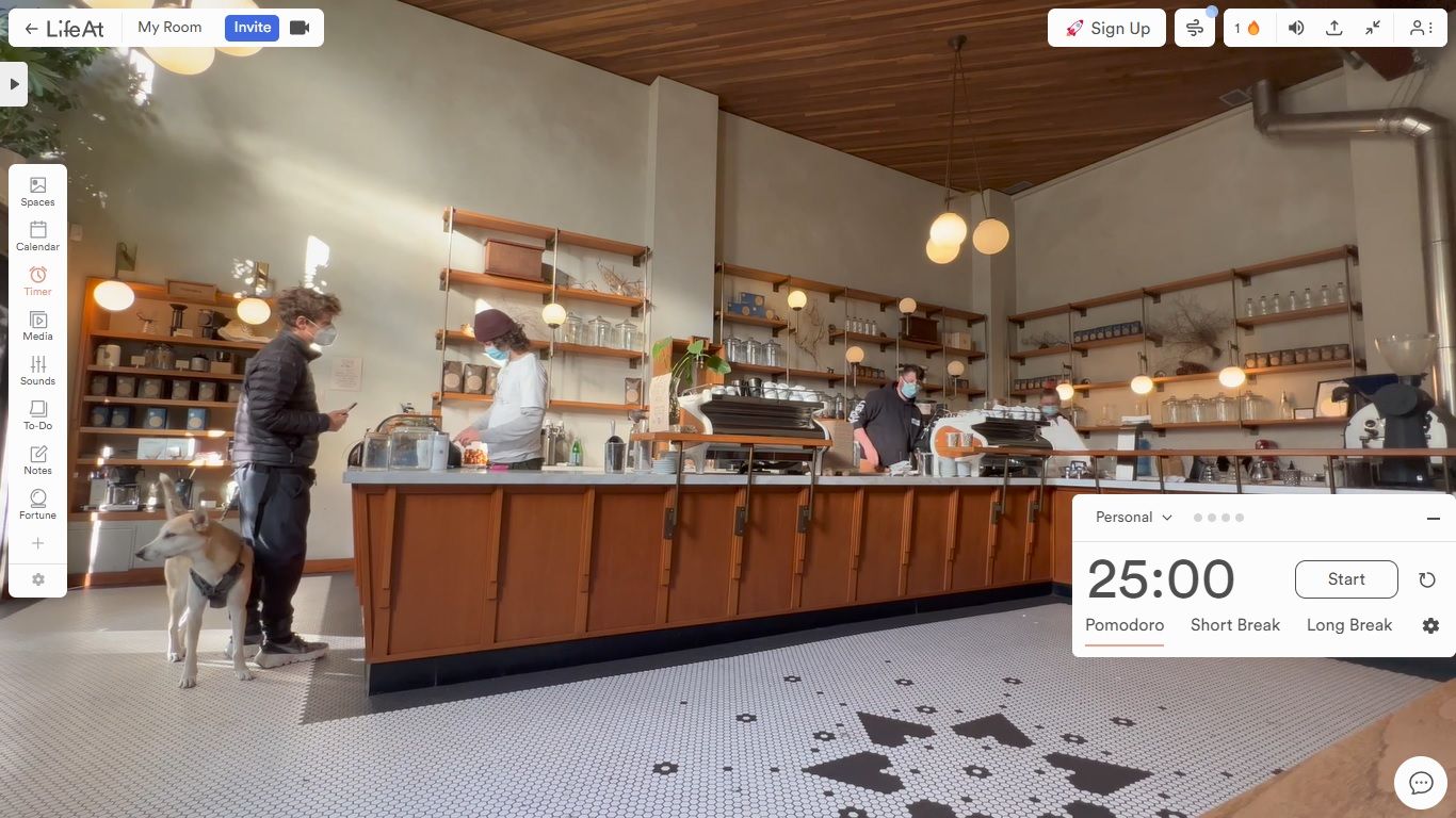 Tangkapan layar aplikasi LifeAt: Ini menunjukkan berbagai kontrol dan pengatur waktu, dengan pemandangan kafe di latar belakang