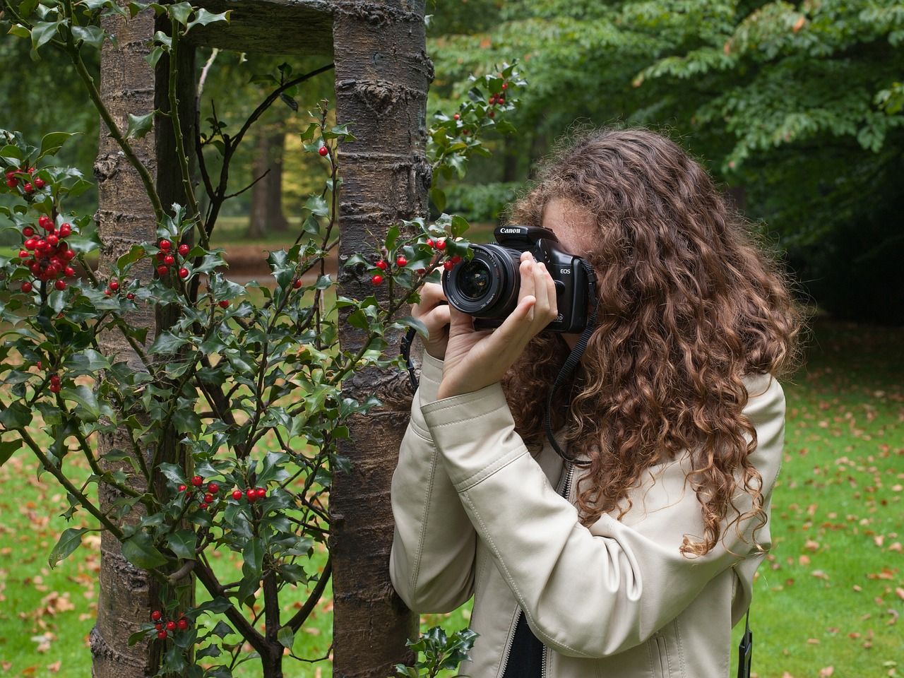 photo of a person taking images with a camera 