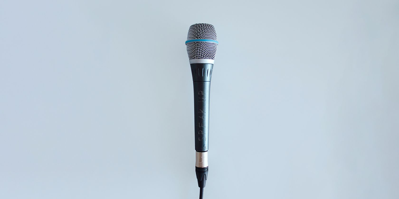 microphone on a baby blue background
