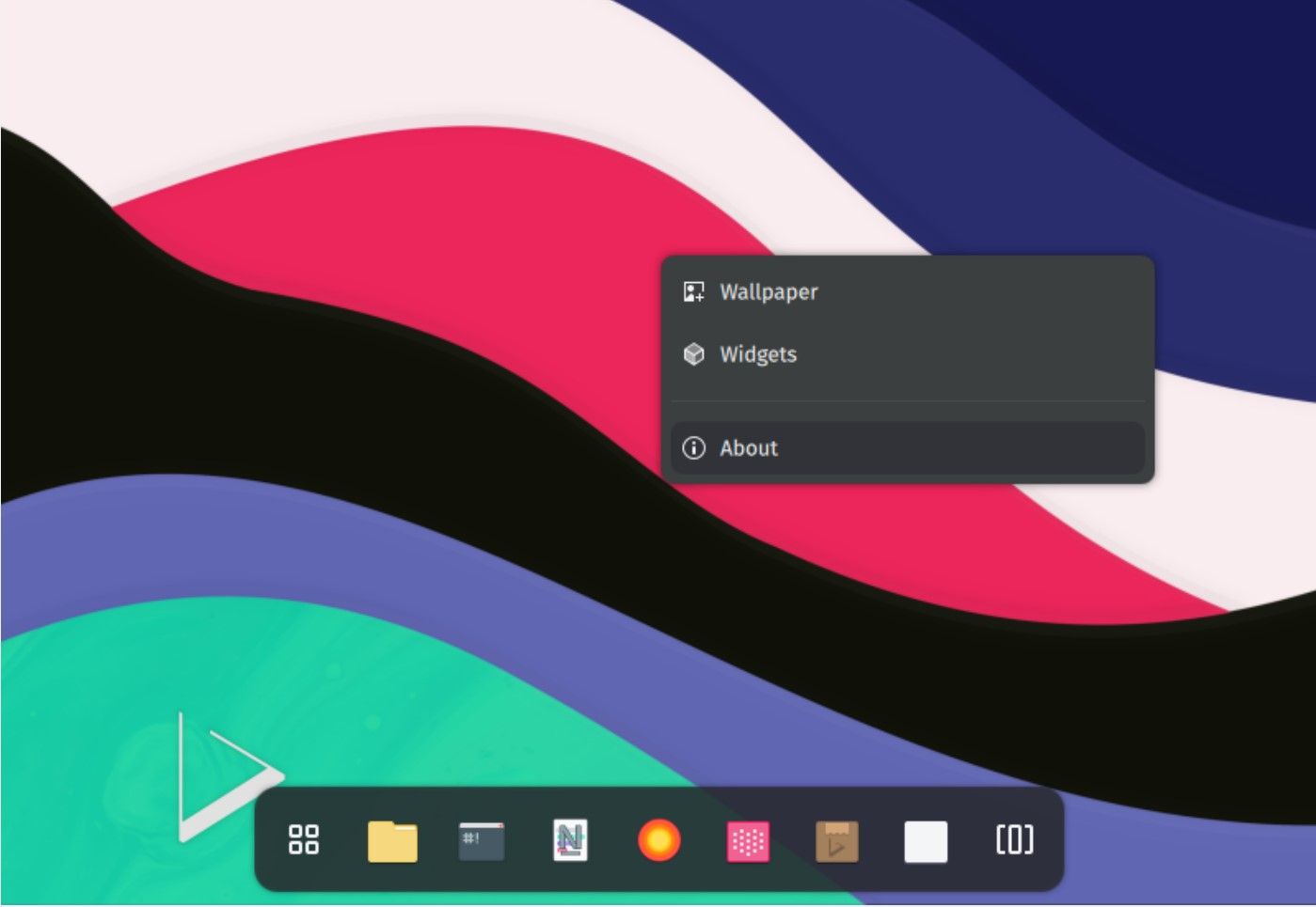 Nitrux desktop environment with a menu bar at the bottom