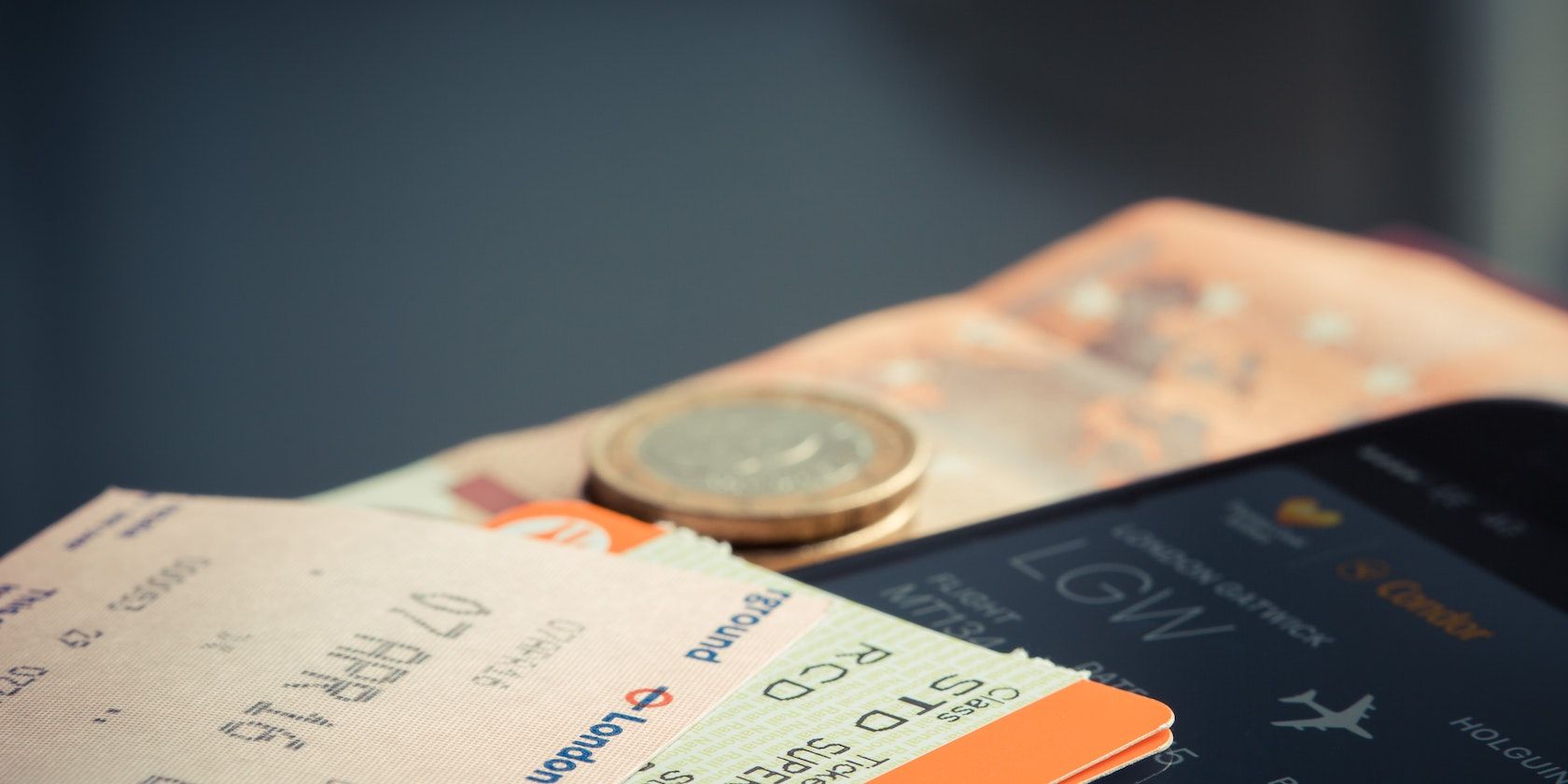 Orange and green label airplane ticket