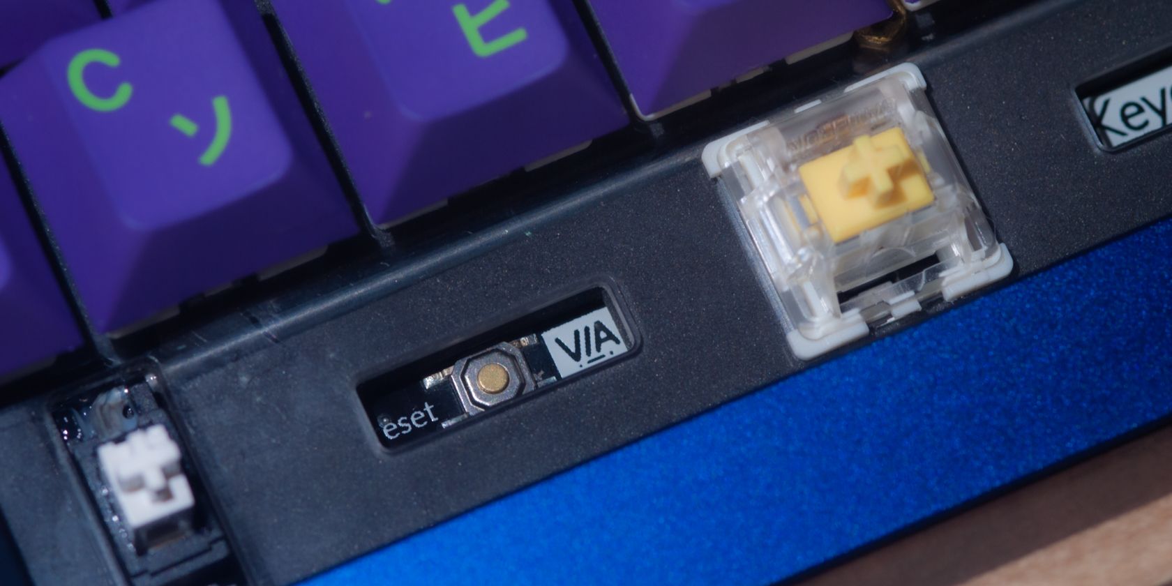 reset button under keyboard plate