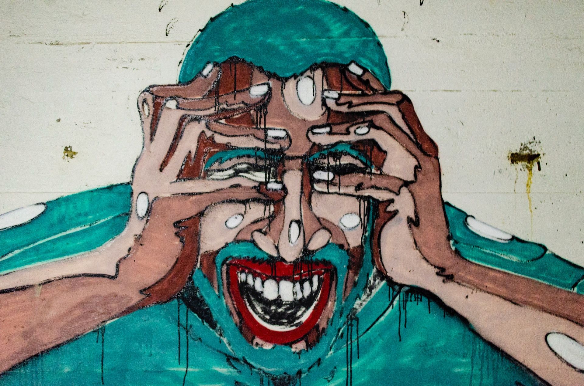 Street art of a man looking sressed