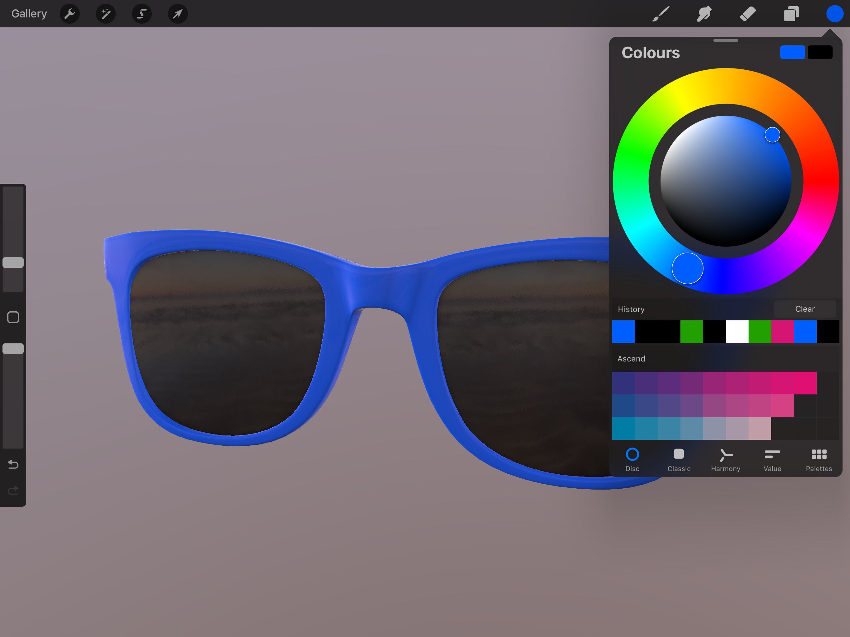 Mô hình 3D của kính râm màu xanh lam và bánh xe màu trong Procreate