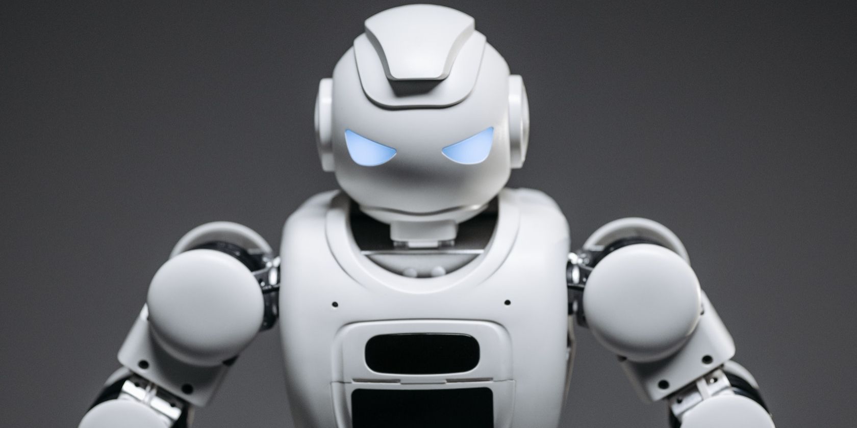 Grayscale photo of a futuristic robot