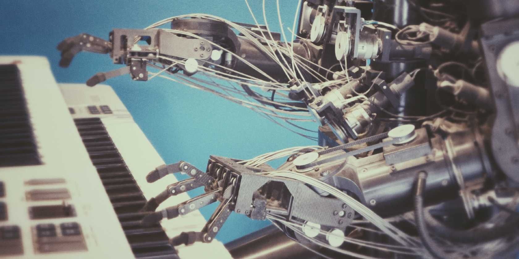 image of a robot playing the piano