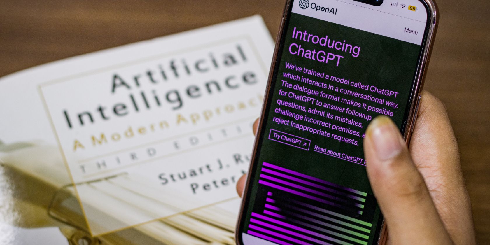 Webpage of ChatGPT, a prototype AI chatbot, is seen on the website of OpenAI, on iPhone or smartphone