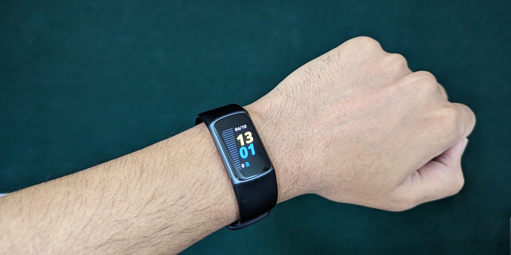 a Fitbit Charge 5 on wrist
