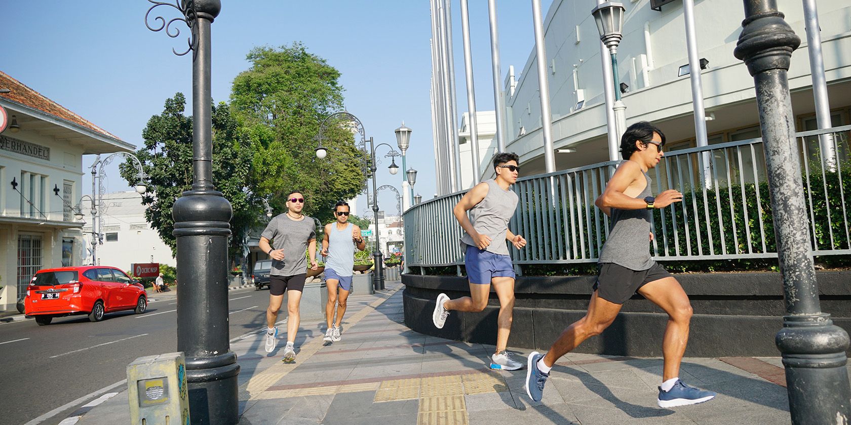 Group of runners in a city