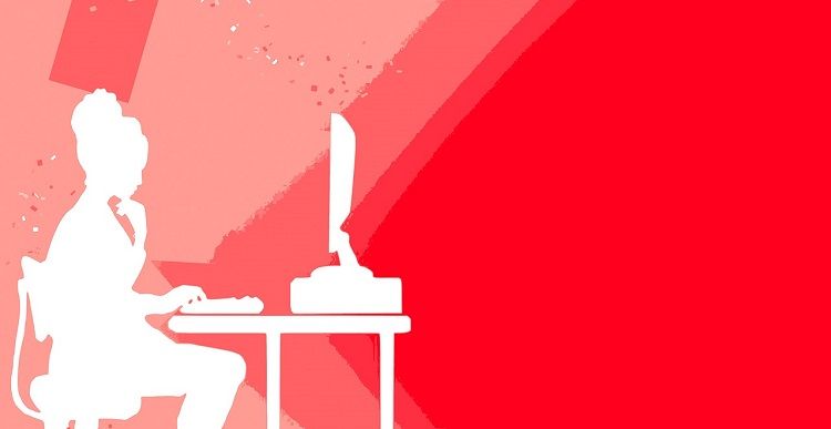 Hình minh họa của một người phụ nữ tại bàn làm việc trên máy tính