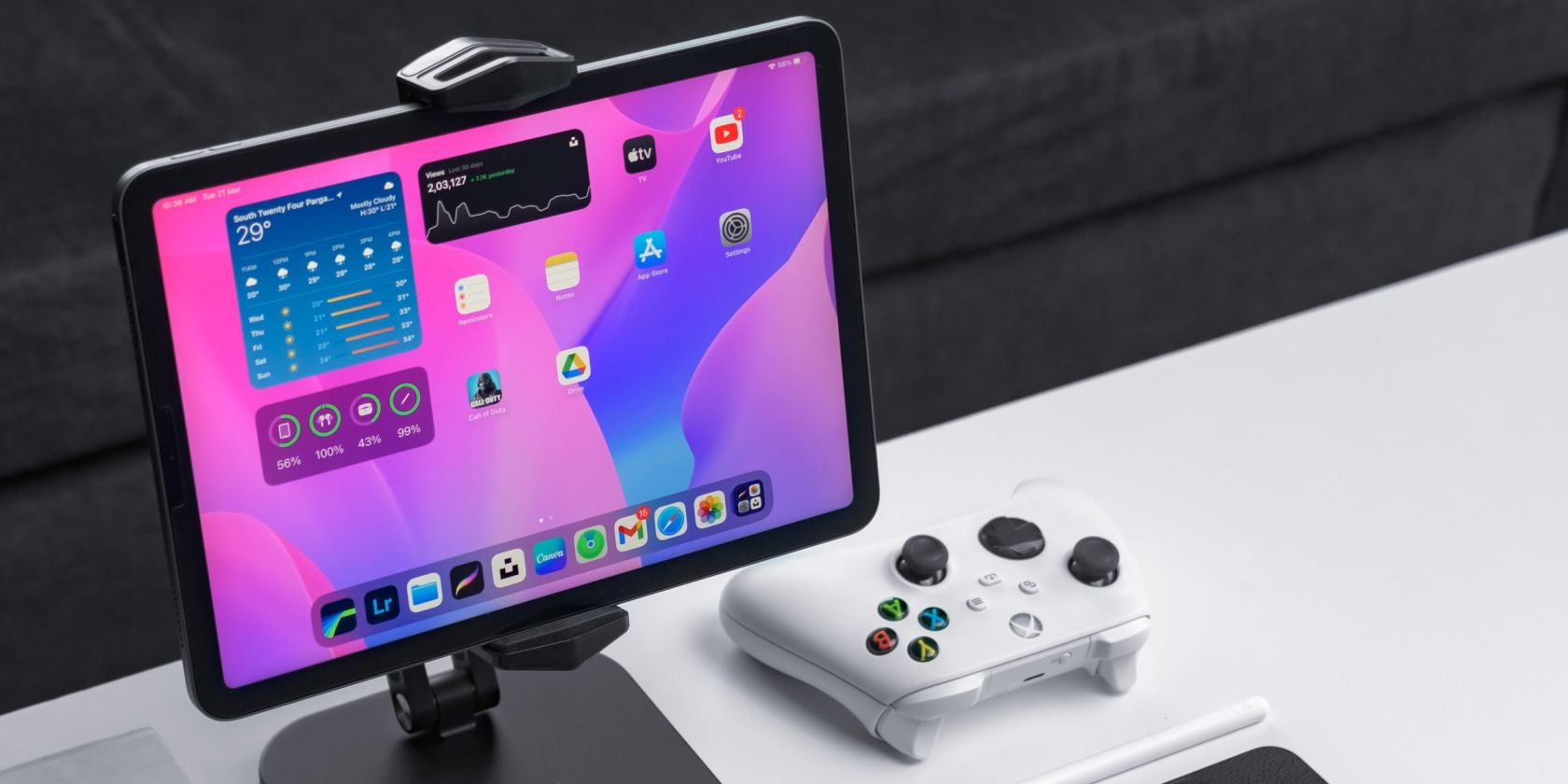 iPad Pro on a stand next to Xbox controller