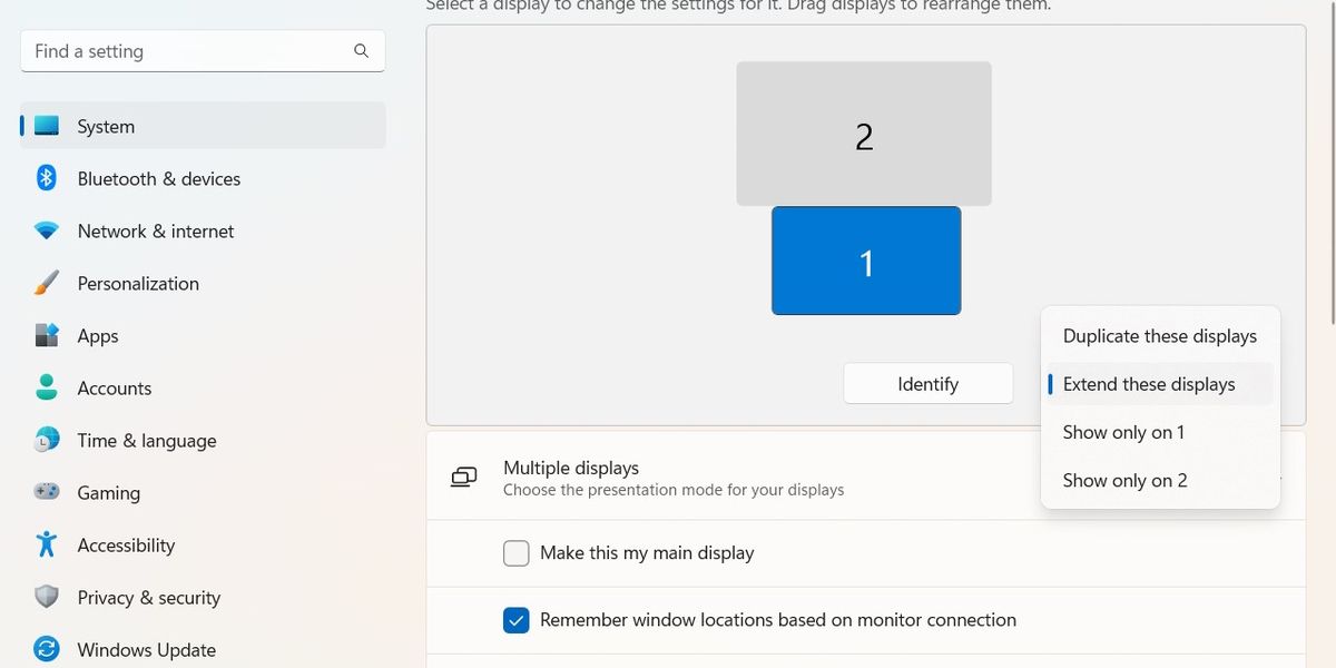 The display behavior menu for a monitor in the Windows Display settings.