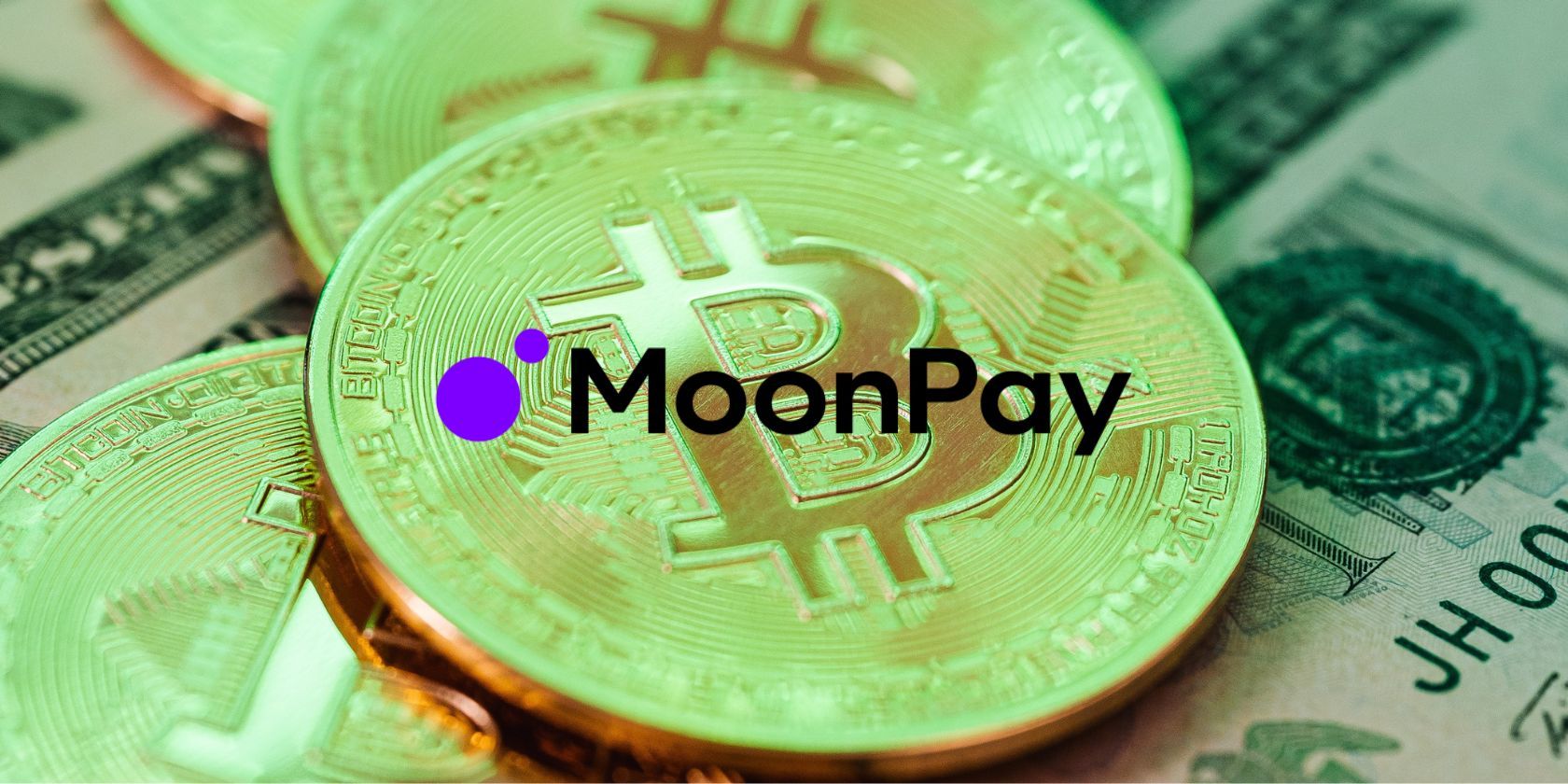 moon pay logo in front of bitcoins and dollar bills