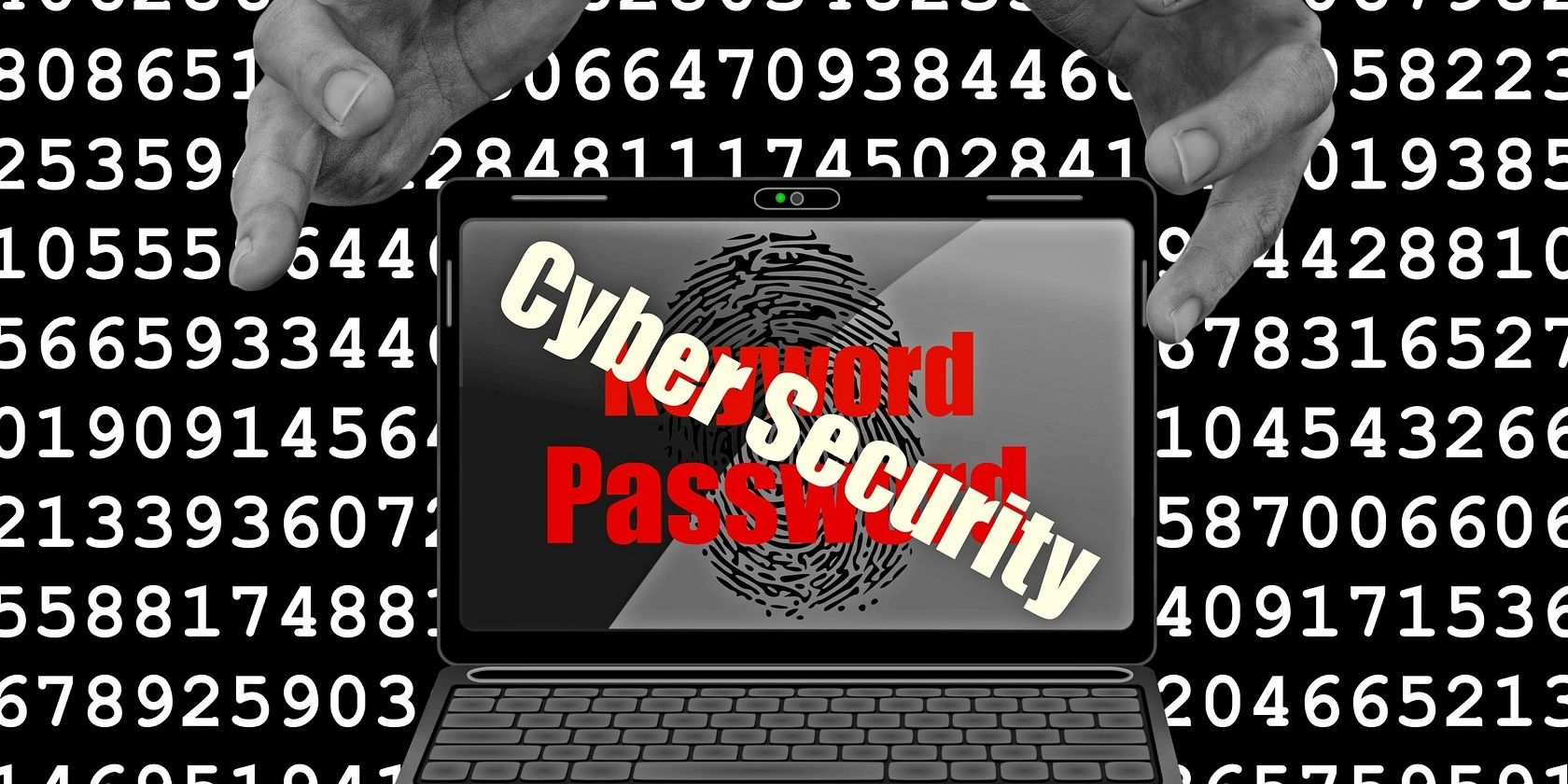cybersecurity on laptop screen with passwords