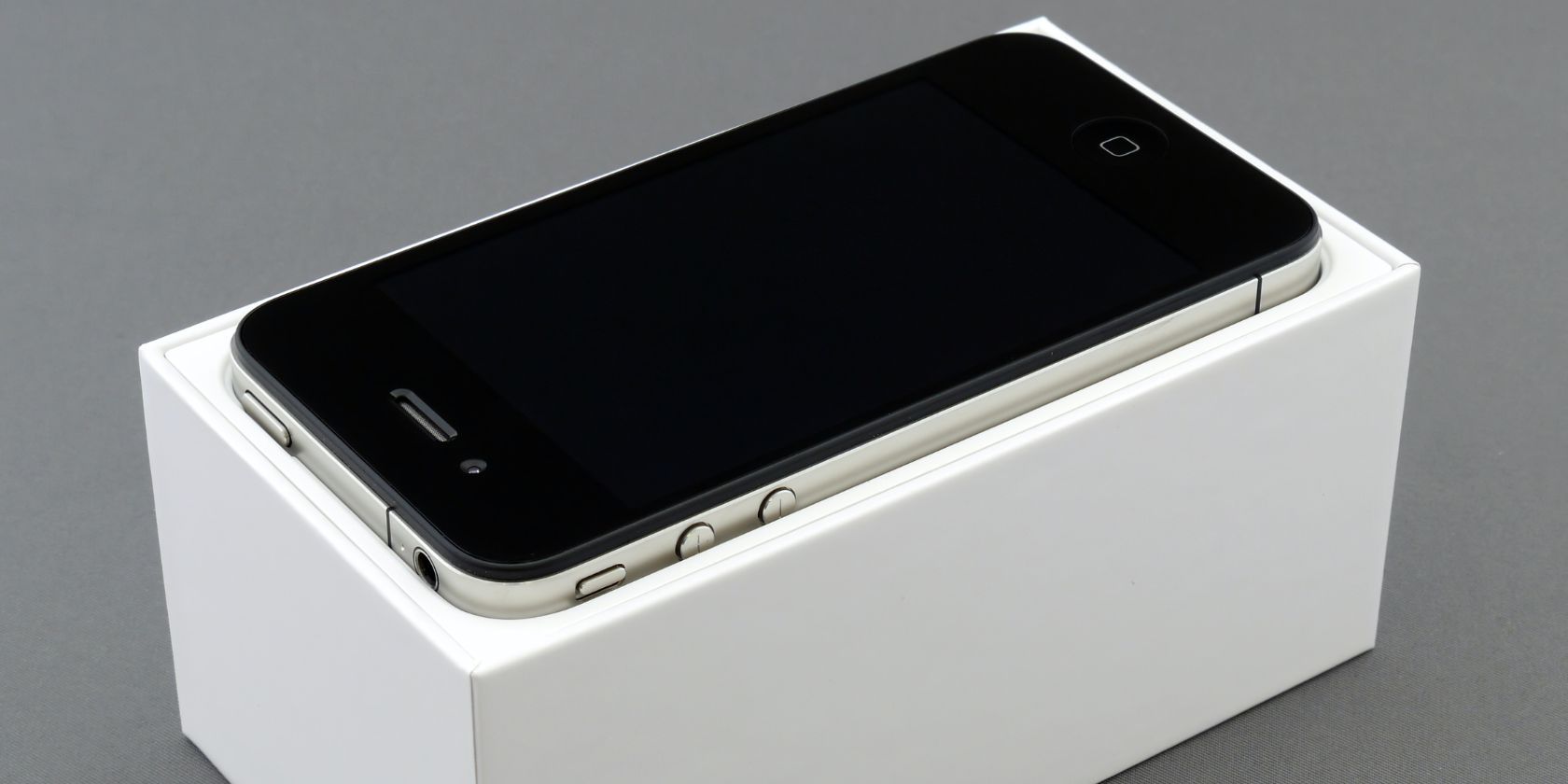 iPhone placed on a white box